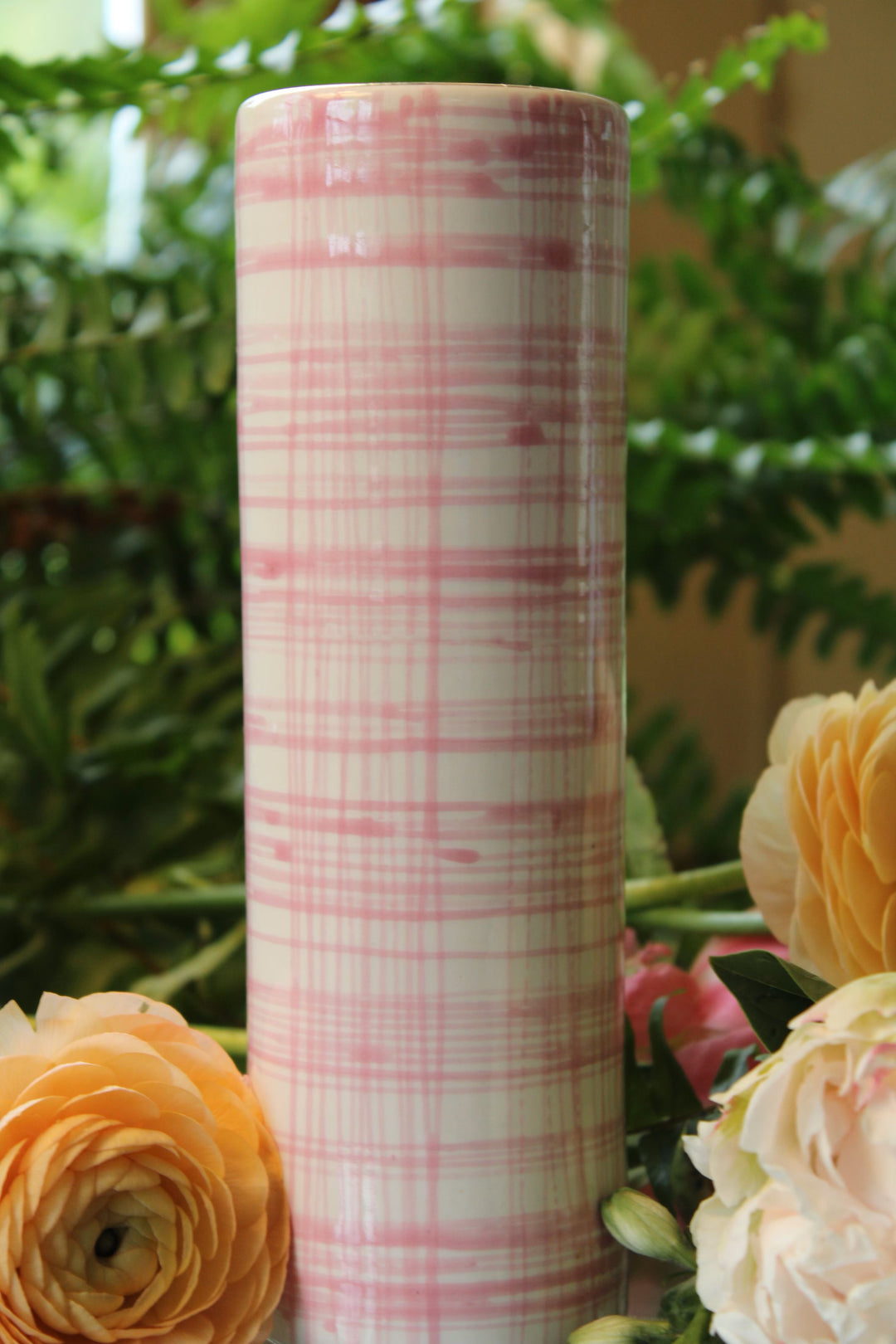 Ceramic vase hand painted with a  pink pattern and a gold rim